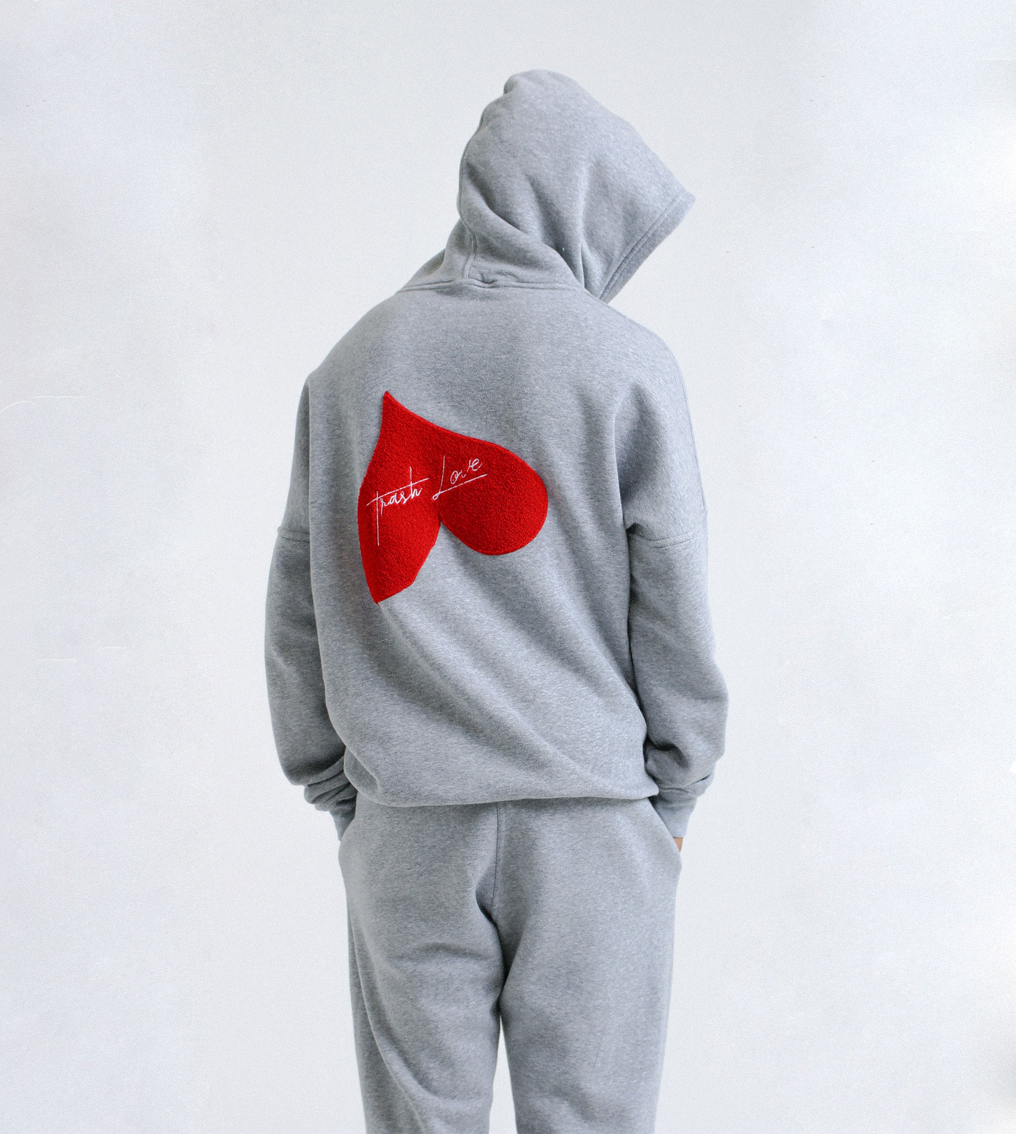 Back view of 'OG Love' Cotton Hoody featuring large chenille love heart embroidery
